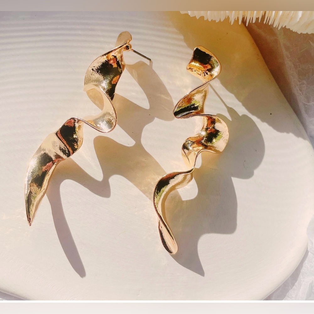 - Free People Gold Twisted swirl Gold pierced Earrings